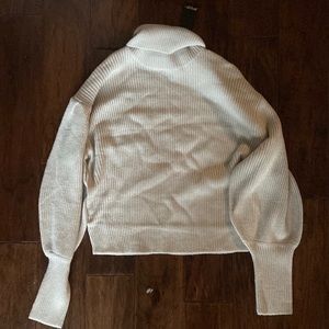 silver gray turtleneck sweater